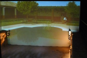 Jardí de Quint Licini. Audivisual on es pot veure la tasca d'un esclau.